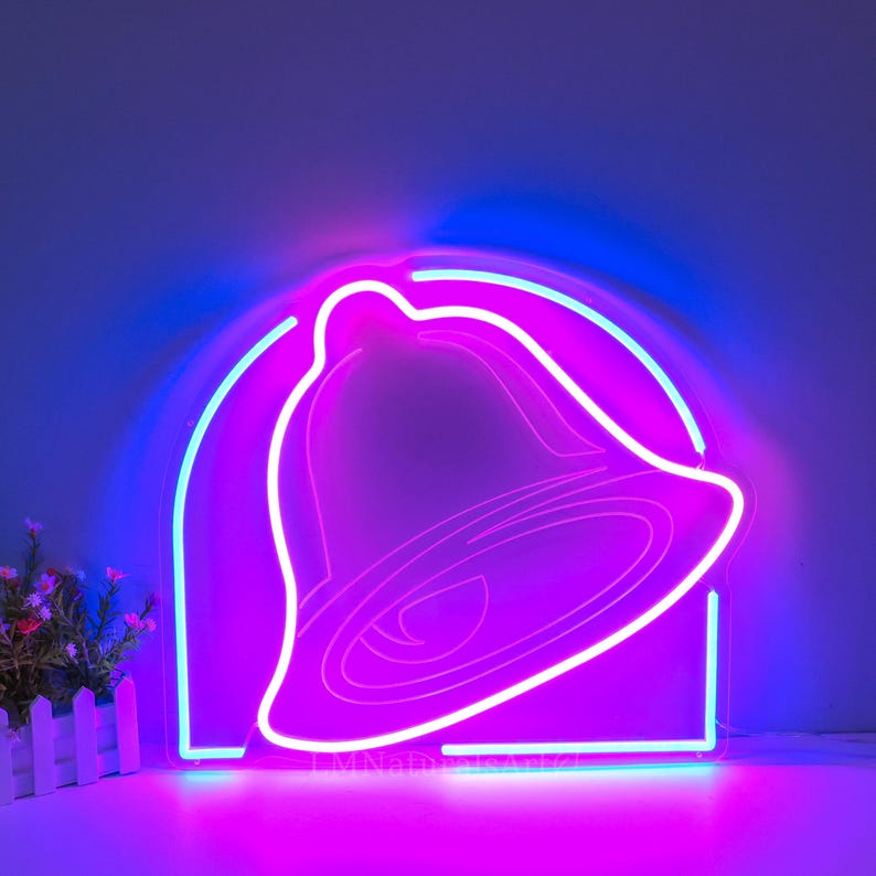 May include: A neon sign shaped like a bell with a pink and blue glow. The bell is outlined in white and the background is a dark purple.