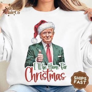 トランプ「クリスマスには家に帰るよ」スウェットシャツ、面白いホリデーサンタハット、政治的な贈り物、面白い政治的なサンタホリデーシャツ