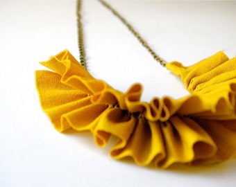 Linen ruffle necklace in mustard yellow.