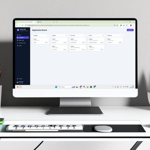 May include: A computer monitor displaying a digital application board interface titled Career OS. The screen shows columns for job statuses including Applied, Interview, Offer, and Rejected, with various company names and job titles listed within.