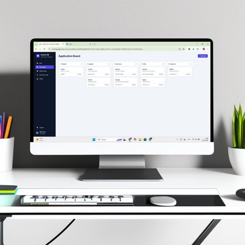 May include: A computer monitor displaying a digital application board interface titled Career OS. The screen shows columns for job statuses including Applied, Interview, Offer, and Rejected, with various company names and job titles listed within.