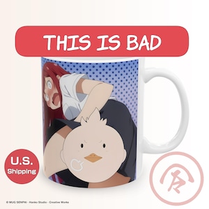 May include: White ceramic mug featuring an anime-style illustration with the text "THIS IS BAD" in a red banner. The mug's design includes a surprised character and a cartoon duck.