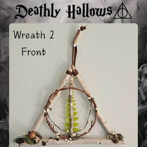 May include: A Deathly Hallows-themed wreath, featuring a triangle, circle, and vertical line design made from twigs, a circular twig wreath, and green glass leaves. The text "Deathly Hallows" and "Wreath 2 Front" are visible.
