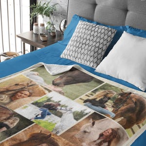 May include: A cream-coloured blanket with a collage of horse and people images. The blanket is on a blue bed, with white and patterned pillows. The images include close-ups of horses and people with horses. The blanket is soft.