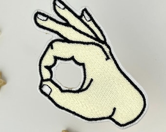 Handbroderad lapp med texten "Gotcha" – Rolig strykbar meme-lapp för jackor, ryggsäckar, väskor | Klassisk nostalgisk prankhandsymbol