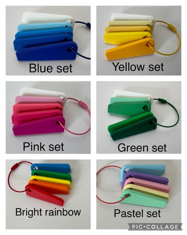 May include: A set of five colorful keychains, each with a different color scheme: blue, yellow, pink, green, and rainbow. The keychains are made of plastic and have a simple, rectangular shape. Each keychain has a small loop at the top for attaching keys.