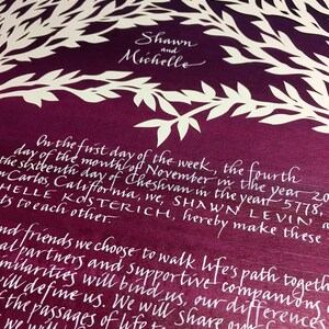 May include: A wedding invitation with a purple background and white calligraphy. The text reads "Shawn and Michelle" and "In the first day of the week, the fourth day of the month of November, the year 2018, the sixteenth day of Cheshvan in the year 5778, Helle Kosterich, Shawn Levin, hereby make these vows to each other."