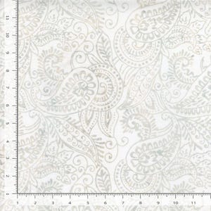 May include: A white fabric featuring a repeating light gray paisley pattern with intricate swirls and floral motifs. A black ruler is visible along the left and bottom edges, showing measurements in inches up to 11 inches on both axes.