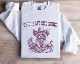 This Is My 2nd Rodeo Funny Raccoon Crewneck Sweatshirt, Western Racoon Gift, Vintage Raccoon Graphic Sweatshirt, Raccoon Funny Meme Sweater