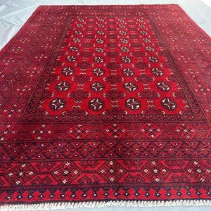 Vintage Afghan Red Rug 5&#39;6&quot; x 7&#39;8 ft | Hand-Knotted Turkmen Bukhara Carpet | Tribal Wool Area Rug | Traditional Nomadic Bohemian Bedroom rug