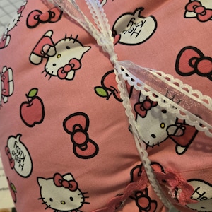 Hello Kitty-winkelwagenhoes: gewatteerde stoelbeschermer