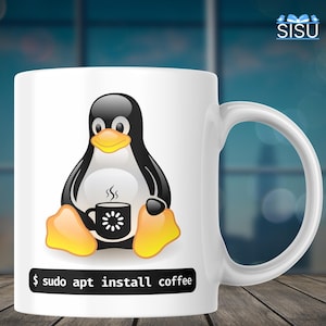 May include: White ceramic mug with a cartoon penguin holding a cup of coffee. The penguin is wearing a black and white tuxedo and has a yellow beak. The text on the mug reads "$ sudo apt install coffee".