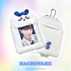 Hachiware photocard holder in white plush with a blue accent and tail detail. Ideal for displaying photocards, IDs, or small photos, with a secure keychain for easy carrying by CottonKoko.