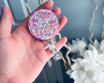 Smiley face badge reel| bright colors| badge reel| retractable badge