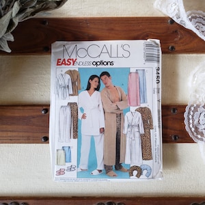 May include: A sewing pattern for a robe with a leopard print design. The pattern is from McCall's and is called "Easy Endless Options". The pattern number is 3450.