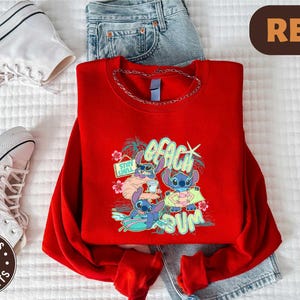 a red shirt with a cartoon character on it