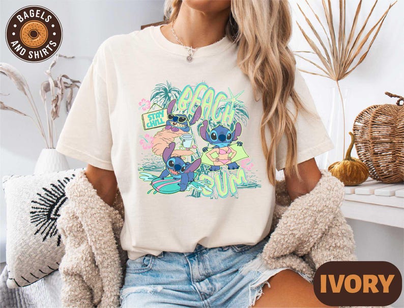 a woman wearing a t - shirt with a cartoon character on it