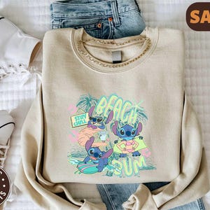 a sweatshirt with stitching on it and a pair of jeans