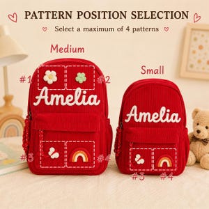 Puede incluir: Dos mochilas rojas de pana, una mediana y otra peque&ntilde;a, con el nombre "Amelia" en escritura blanca. La mochila mediana tiene parches de flores y arco&iacute;ris. El texto dice "PATTERN POSITION SELECTION" y "Select a maximum of 4 patterns".