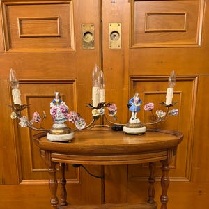 Pair of antique French circa 1930-1940’s boudoir porcelain gilt tole figural lamps.