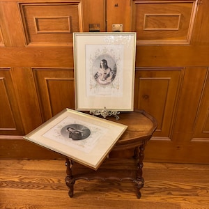 A pair of framed cardstock prints of antique engravings from the 19th century circa 1878 printing of ‘Moore’s Irish Melody’s’.