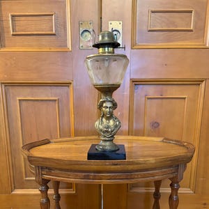 Antique late 1800’s 14” tall figural female bust oil lamp with frosted floral design.