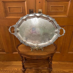 A large 27.5”  antique early 20th century (early 1900’s) Edwardian period, Barker Ellis Silver Co. silver plated serving platter, English