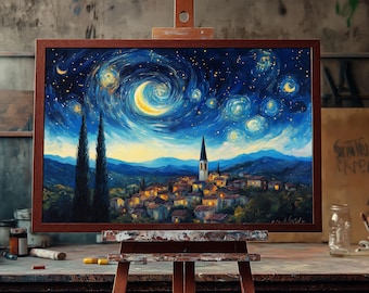 May include: A painting on canvas depicting a starry night sky with a crescent moon and swirling clouds over a small village with a church steeple. The painting is framed in a dark wood frame and is displayed on an easel.