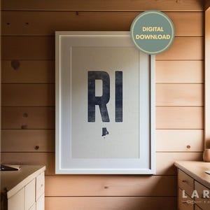 May include: A framed wall art print featuring the large dark blue letters RI with a small silhouette of the state of Rhode Island positioned directly below the letters. A circular green badge in the top right corner reads DIGITAL DOWNLOAD.