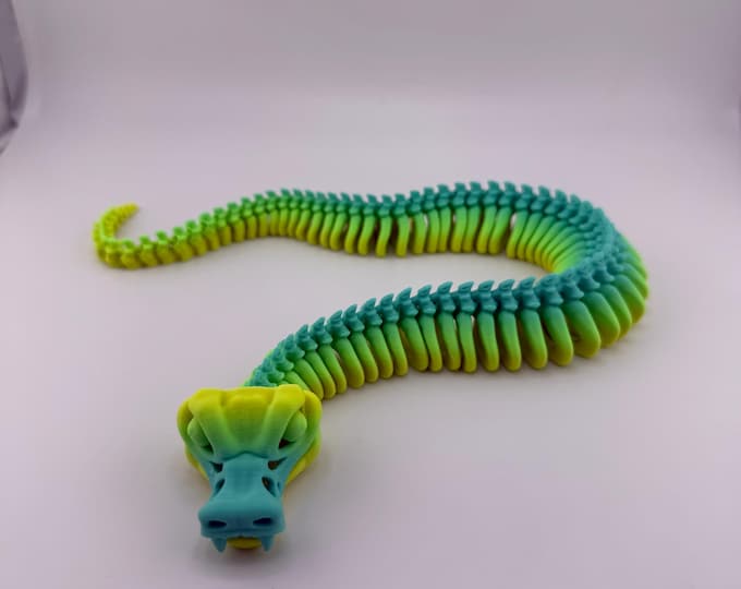 Articulating 3-D snake skeleton with movable mouth