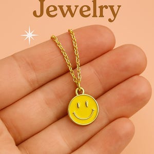 Smiley Face Pendant Necklace: Yellow Enamel Charm, Gold-Tone Chain