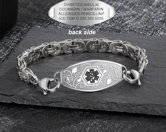 Könnte beinhalten: Ein silbernes medizinisches Armband mit einem floralen Design und einem schwarzen Stern-des-Lebens-Symbol. Das Armband hat einen Verschluss und ein Schild mit der Aufschrift "DIABETES, INSULIN COUMADIN / WARFARIN ALLERGIES:PENICILLINP ICE:TOM G 555.555.5555 back side".