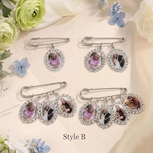 May include: Silver-toned brooch pins with oval photo pendants. Each pin features a safety pin design with multiple pendants. The pendants display portraits of people. The text "Style B" is at the bottom of the image.
