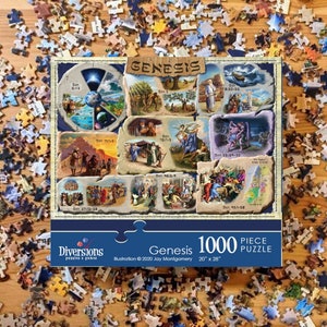 May include: A 1000 piece jigsaw puzzle featuring illustrations of scenes from the book of Genesis in the Bible. The puzzle is titled "Genesis" and is 20 inches by 28 inches. The puzzle is made by Diversions Puzzles & Games.