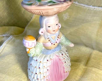 Vintage costumed girl ceramic vase with basket of flowers on head and an orb in hand planter vase 50s planter or vase