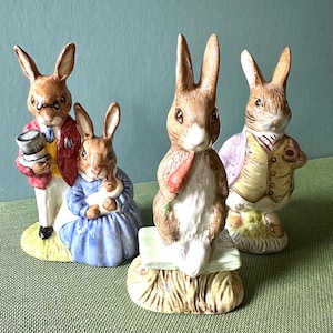 Beatrix Potter rabbit figures 3 pcs Made in England labeled Easter decor includes Peter