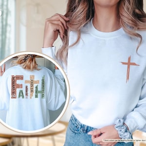 May include: White sweatshirt with a cross on the front and the word "FAITH" with bible verses on the back.