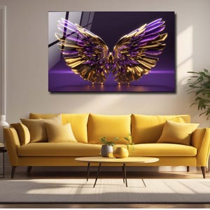 May include: A pair of gold and purple angel wings with a 3D effect, set against a purple background.