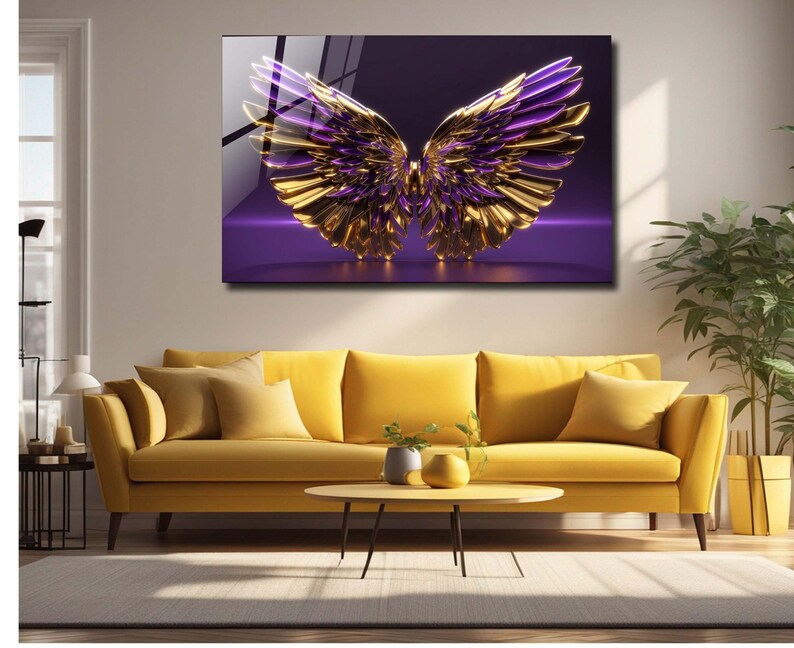 May include: A pair of gold and purple angel wings with a 3D effect, set against a purple background.