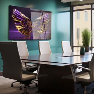 May include: A modern office meeting room with a large abstract artwork of gold and purple wings hanging on the wall. The room has a large wooden table with six chairs around it.