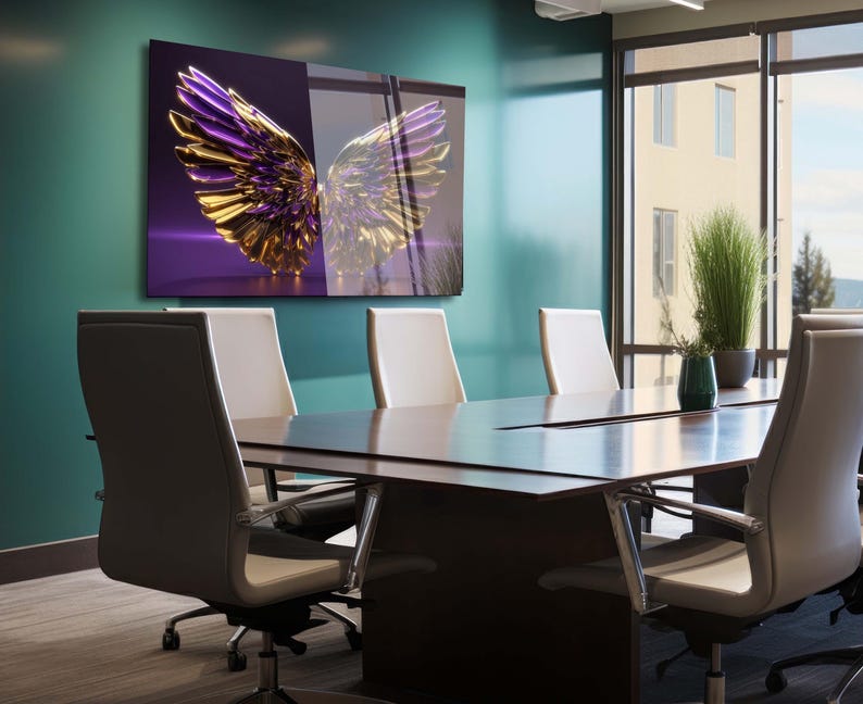May include: A modern office meeting room with a large abstract artwork of gold and purple wings hanging on the wall. The room has a large wooden table with six chairs around it.