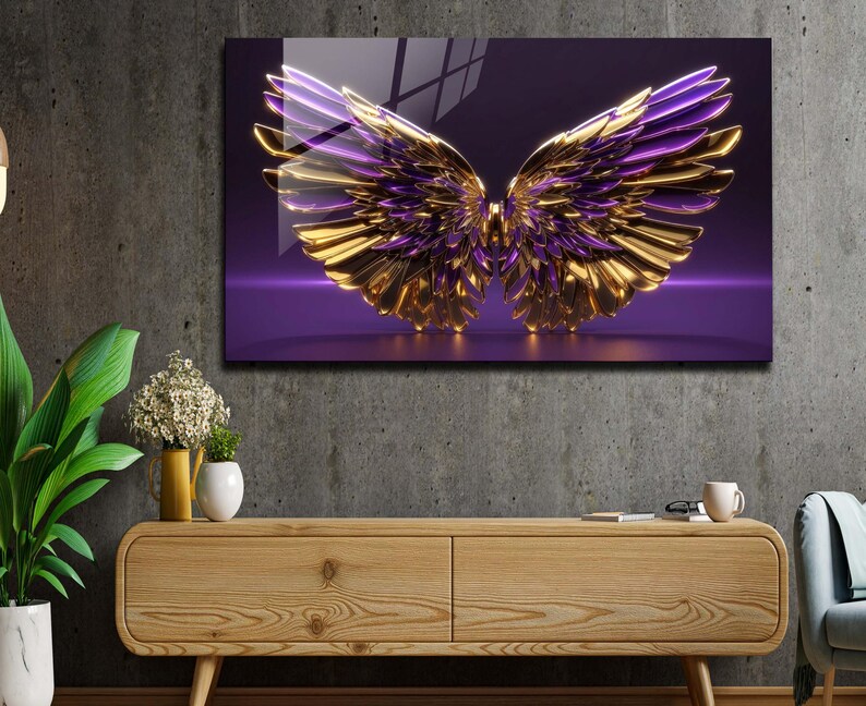 May include: A pair of gold and purple angel wings with a 3D effect, set against a purple background.