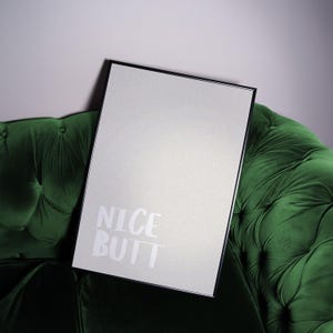 Contemporary minimalist poster with subtle humor, showcasing clean typography in light grey on white. The design is simple yet expressive, perfect for adding personality to neutral home decor. Displayed in a modern lifestyle scene, it blends effortlessly into Scandinavian-inspired interiors.