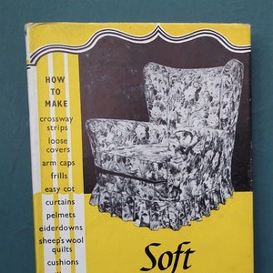 May include: A vintage book cover titled "Soft Furnishing" with a yellow and black design. The cover features an illustration of a floral patterned armchair. Text includes "How to Make" and a list of soft furnishing items.