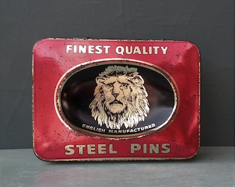 Vintage pin tin steel pins English manufacture Lion Brand sewing collectible haberdashery supplies - red black gold tone metal - hinged lid