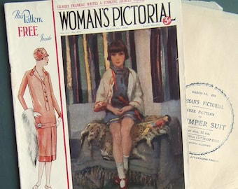 Op de afbeelding: Een vintage tijdschriftcover met een vrouw in een rode jurk en een meisje in een witte jurk met een luipaardprint achtergrond. Het tijdschrift is getiteld "Woman's Pictorial" en de datum is 6 maart 1928. De tekst "This Pattern Free Inside" is ook zichtbaar.
