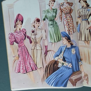 May include: Illustration of vintage fashion designs from a magazine. The page features several women in dresses and suits, showcasing styles from the 1940s. Dresses are in shades of pink, green, and blue, with hats and gloves. The artwork has a retro aesthetic.