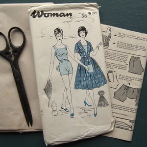 May include: A vintage sewing pattern for a woman's dress and shorts. The pattern is printed on white paper with black ink and includes instructions and diagrams. The pattern is for bust size 36 and is labeled "Woman W 399".