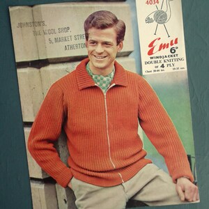 May include: An orange zip-up knit jacket with a ribbed texture, worn with beige trousers. The image includes text for "Johnston's The Wool Shop" and "Emu Windjacket Double Knitting". The jacket's chest size is 96-112 cm.