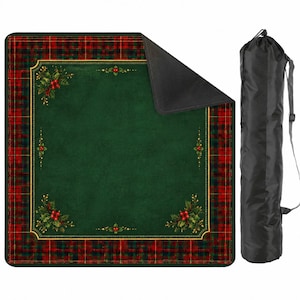 May include: A square picnic blanket featuring a dark green center with holly berry accents, surrounded by a red and green plaid border. The blanket has a black underside and is shown with a matching black cylindrical carrying bag with a strap.